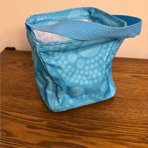 Thirty-One Gifts, in a retired print called "Aqua Circle Spirals" NWOT